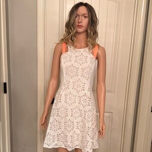 Jealous Tomato White Mini Dress with Bold Orange Accents